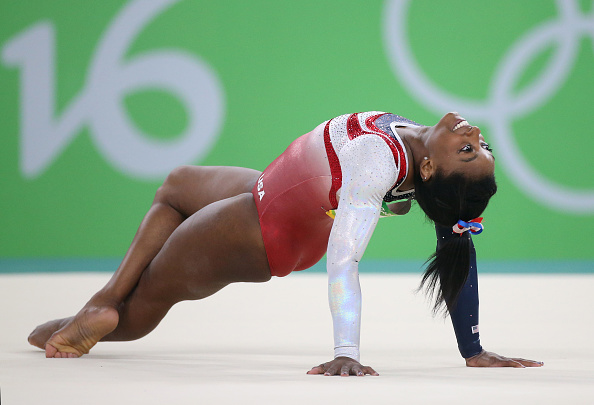 RIO DE JANEIRO, BRAZIL - AUGUST 9: Simone Biles of USA competes in the Artistic Gymnastics women's team final on day 4 of the Rio 2016 Olympic Games at Rio Olympic Arena on August 9, 2016 in Rio de Janeiro, Brazil. (Photo by Jean Catuffe/Getty Images)