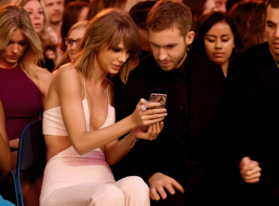 rs_560x415-150518153504-1024-taylor-swift-calvin-harris-billboard-phone-ls-51815